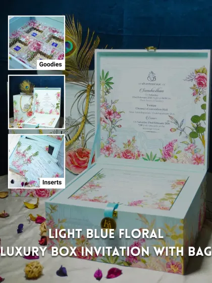 This light blue floral luxury box is perfect for a sophisticated, modern wedding. It features space for goodies and custom inserts, all presented in an elegant box with a matching carry bag.