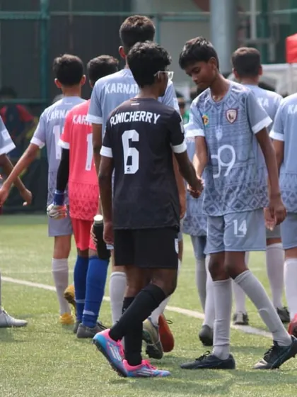 Players shaking hands before a match. This simple gesture reinforces the values of fair play and respect that are central to my tournaments.