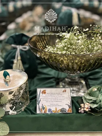 The Crystal Elfin Hamper, designed for the wedding season. This gift set, featuring a crystal bowl and silver-finished jar on a bed of emerald velvet, brings a touch of magic to your celebration.