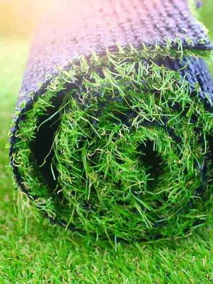 This is a close look at the high-quality artificial turf I use before it's installed. The dense fibers and durable backing are designed to be UV-resistant and weatherproof, ensuring a long-lasting, vibrant green lawn for your space.