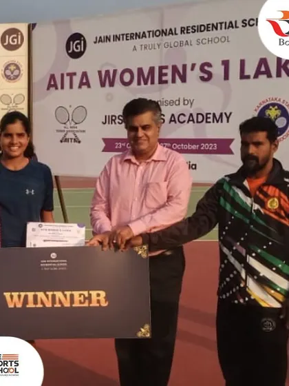 Suhita Maruri with her winner's trophy at the AITA Women's 1 Lac event.