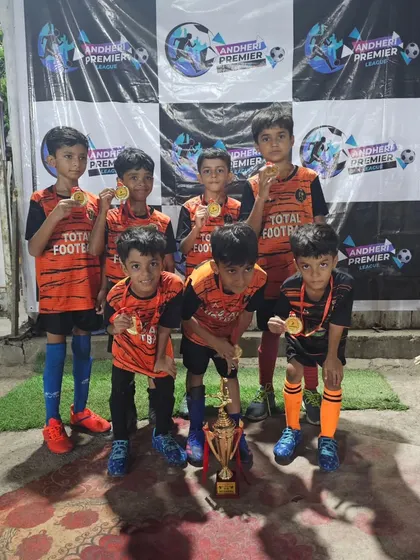 Our U9 team celebrating their championship win at the Andheri Premier League.