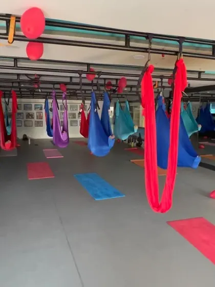 The aerial studio from another angle, showing the setup of the silks.