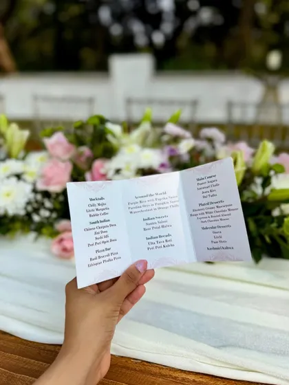 It's all about the small details. A personalized menu card adds a touch of elegance and thoughtfulness to the dining experience.