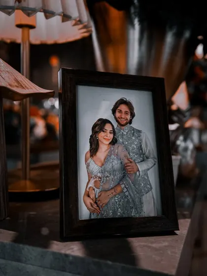 Another beautiful photo of the couple, displayed as part of the decor. These personal elements make the celebration feel truly theirs.