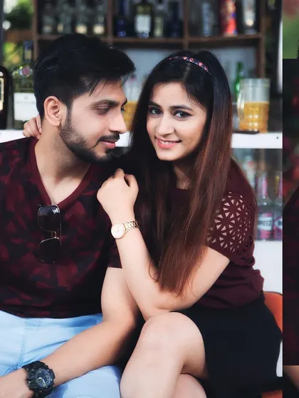 A sweet and candid moment from their cafe-themed pre-wedding shoot. His loving gaze and her bright smile perfectly capture their relationship.
