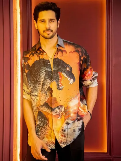 A slightly different pose showing the relaxed confidence of the look. This kind of celebrity styling is about finding pieces that are both fashionable and comfortable for the talent.