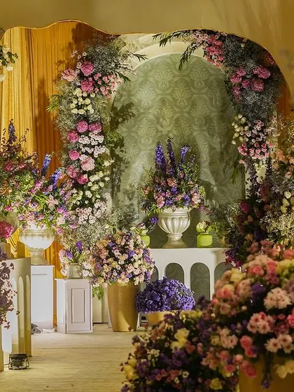 A stunning floral archway, creating an immersive and romantic entrance for guests.