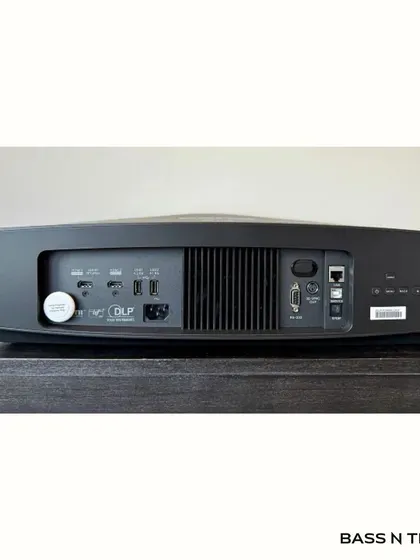 The back panel of the BenQ W5800 shows the connectivity required for a high-performance setup. We handle the complete integration, ensuring your projector works seamlessly with your audio processor, players, and control systems for a simple, one-touch movie experience.
