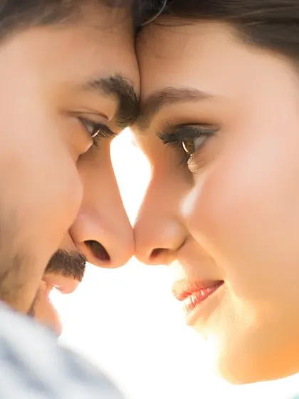 Sometimes, the most powerful stories are told in the quietest moments. This intimate pre-wedding close-up, with the sun creating a natural flare, is all about capturing the raw connection and unspoken love between a couple.