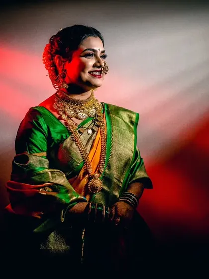 A creative portrait using colored and shaped lighting to create a modern and artistic look for the traditionally dressed bride.