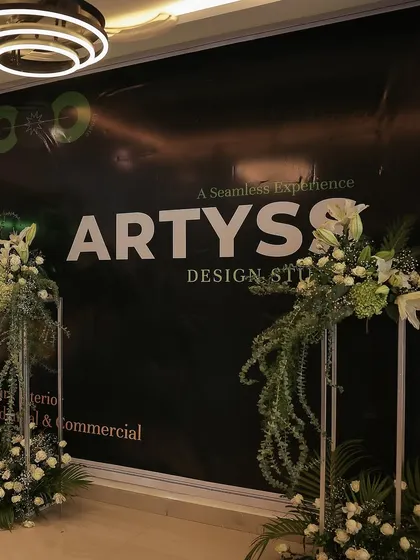 The entrance to our grand opening, beautifully decorated with flowers. It was the start of a new chapter for Artyss Designn Studio.