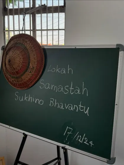"Lokah Samastah Sukhino Bhavantu." May all beings everywhere be happy and free. A simple yet profound prayer written on a chalkboard in Mysore, a message I carry in my heart.