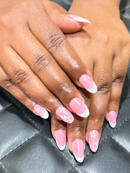 This angle highlights the glossy finish and perfect shape of this elegant French manicure set.