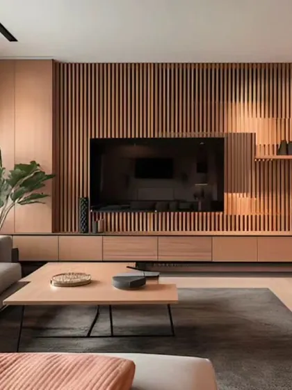 I love using fluted wood panels to add texture and depth. This TV unit is a great example of how it can elevate a modern living room design.