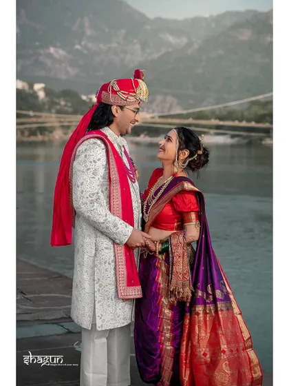 A portrait of the Marathi couple against the backdrop of the Ganga and the mountains, a perfect blend of tradition and nature.