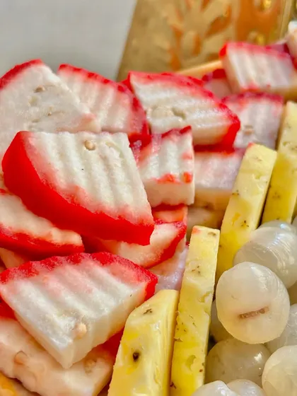 A close-up of sliced water-apple and pineapple, showcasing the freshness and vibrant colors of the fruit I use.