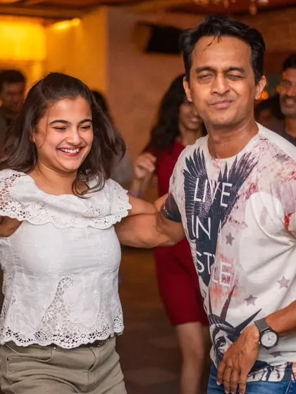 A fun and energetic dance with a big smile.