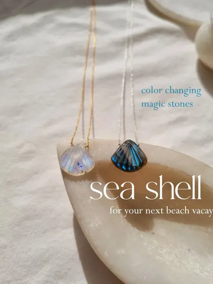 My color-changing magic stones. This image shows my Rainbow Moonstone and Labradorite shell pendants, perfect for your next beach vacation.