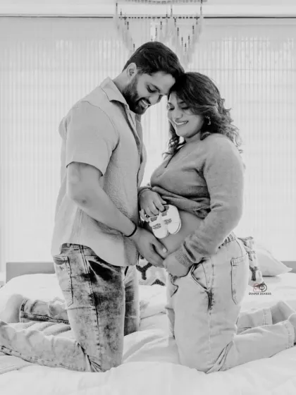 The joy of togetherness in a casual, light-filled setting. Lifestyle maternity sessions at home are perfect for capturing authentic moments in your own space.
