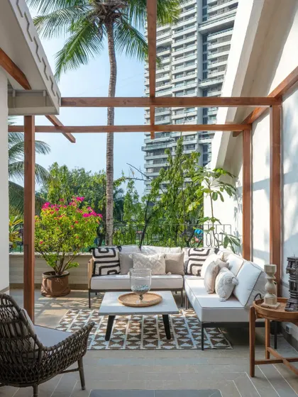 An outdoor terrace connected to the master suite at Summer Haus. We designed this space as a private urban oasis, with comfortable seating and lush planters, offering a quiet escape amidst the city's skyscrapers.