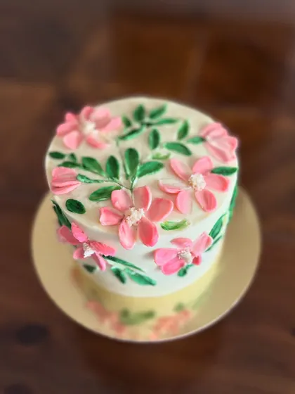 A sweet and simple cake with palette knife painted pink flowers for a lovely new couple. A perfect way to celebrate sweet beginnings.