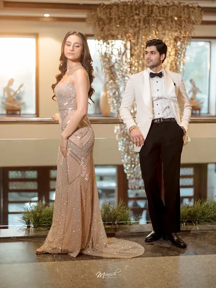 A stylish, posed shot that looks like a magazine editorial. We work with couples to create high-fashion pre-wedding looks that are both elegant and powerful.