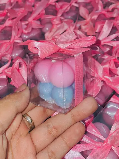 A pink and blue bubble candle, a perfect little favor for a baby shower or gender reveal party.