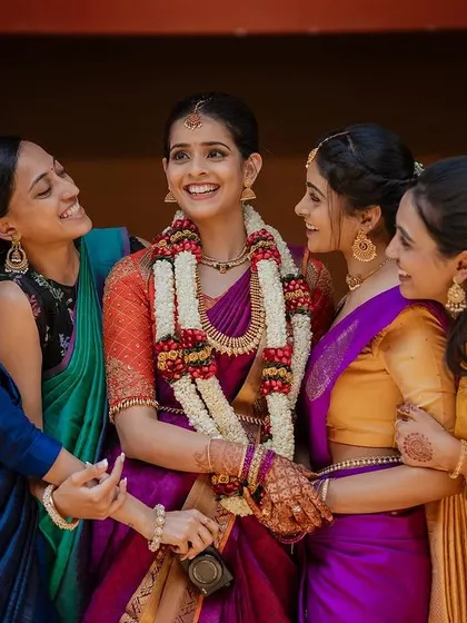 A bride surrounded by her best friends. The laughter and support from the bride tribe are some of the most beautiful candid moments to capture on a wedding day.