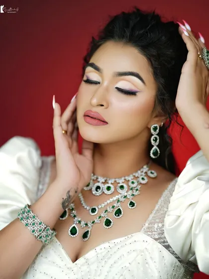 The focus here is on the flawless skin and the perfectly defined features.