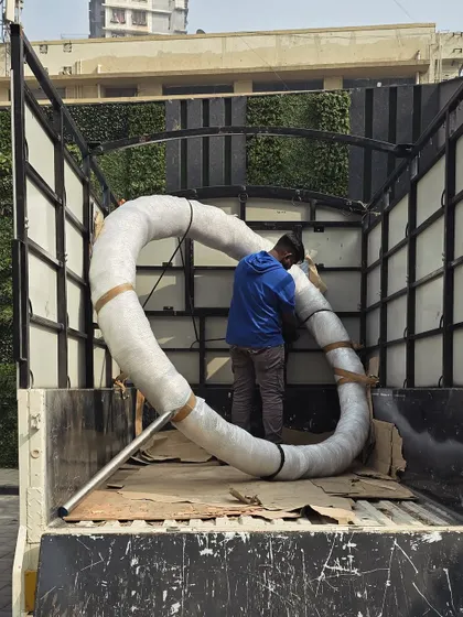 Something new and big is on its way. A 7-foot sculpture, carefully wrapped for transport to the installation site.