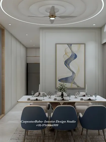 This dining area is clean and minimalist, with a large abstract painting as the main focal point. The design proves that sometimes, less is more.