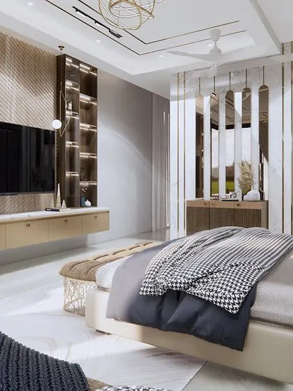 This wide view of the master bedroom highlights the floating TV console and integrated shelving. The combination of different wood textures and a neutral color palette creates a sophisticated and cohesive look.