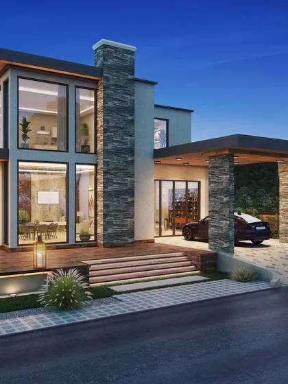A modern home featuring a prominent stone chimney and a covered carport. This evening render focuses on the interplay between the warm interior lights and the cool tones of the twilight sky.
