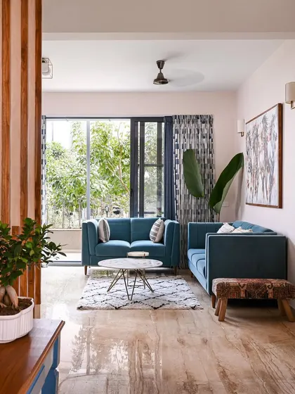 A duplicate of image 240, showing the bright and airy living room.