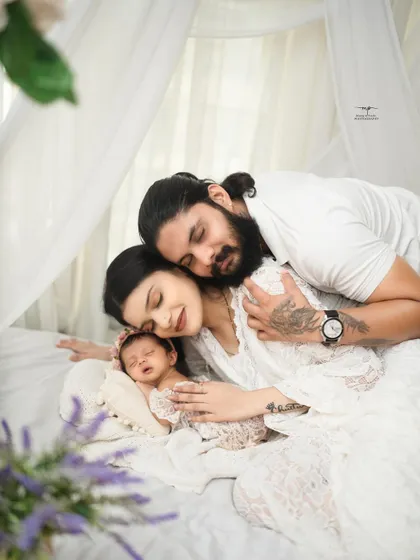 A perfect moment of peace, held together by love. This is what it's all about: the three of you, in your own beautiful world. I create these serene family portraits to freeze this fleeting time forever.
