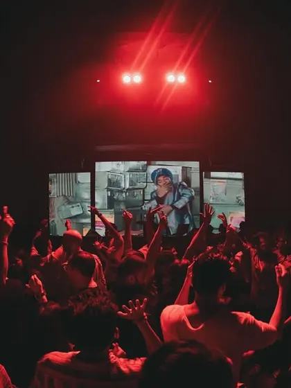 The crowd at Tantra, lost in the music under the red lights. My visuals, featuring artists like AP Dhillon, are designed to match the vibe of the tracks I play.