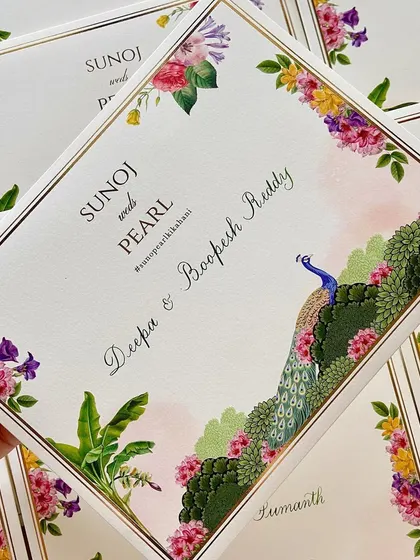 Envelope addressing has my heart. I addressed these gorgeous floral and peacock-themed invites with classic copperplate calligraphy, adding a personal touch to each one.