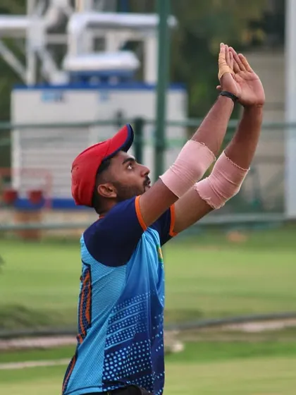 A fielder demonstrates perfect positioning and timing for a high catch near the boundary. Every step counts when you own your zone.