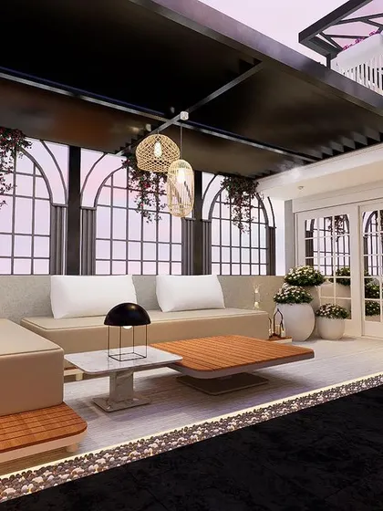 A close-up of the seating area under the pergola at "The Palms" project. The arched window designs and hanging pendant lights add to the elegant, European feel of the space.