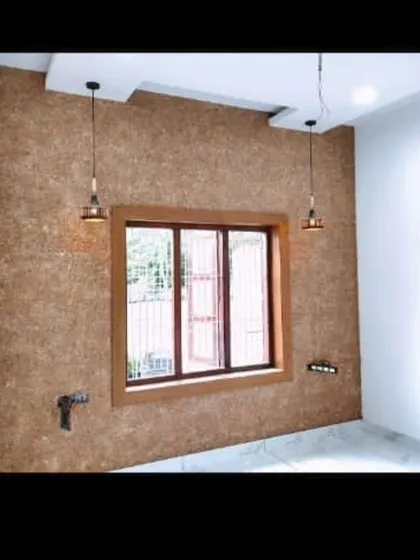 A similar cork or textured wallpaper in a lighter shade.