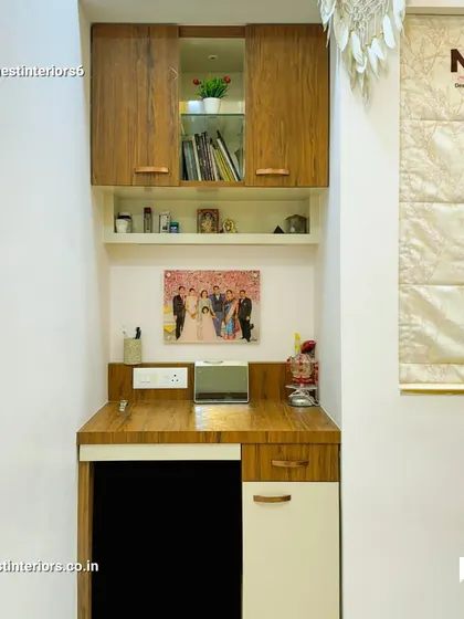 Even a small corner can be converted into a useful study nook. This compact desk with overhead storage is perfect for work-from-home needs or as a study corner.