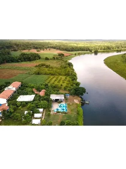 This aerial view shows one of my earlier resort projects in Dandeli, nestled by the river. Over time, the landscape has matured and taken over, blurring the lines between the architecture and the wild context of the Western Ghats.