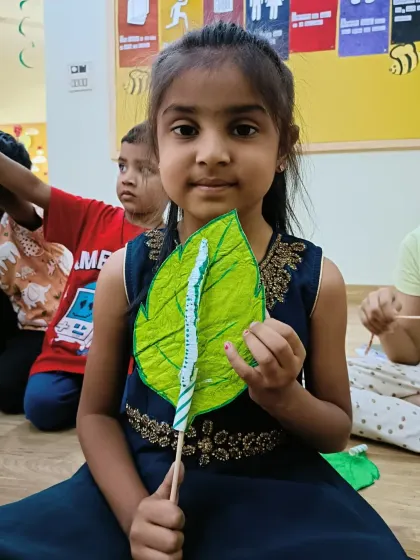 This little Aster is ready to play with her handmade moving caterpillar. Our craft sessions often result in toys that provide hours of imaginative play.