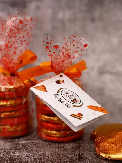 Our chocolate biscuits, elegantly packaged for gifting. These small pouches are great for adding to larger Diwali hampers or as party favors.