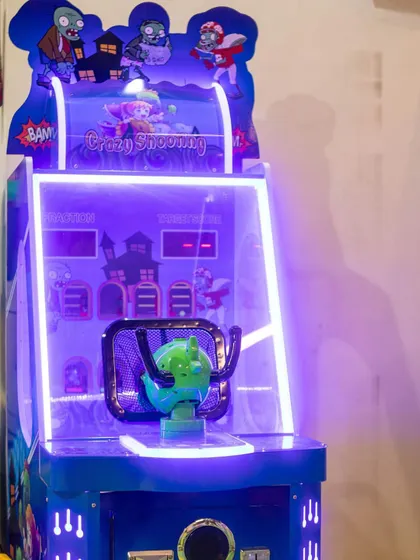 The Crazy Shooting game is another fun, neon-lit arcade challenge that kids love.