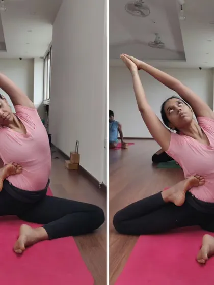 A student demonstrates a seated hip-opening posture. Our classes emphasize the importance of hip mobility for overall health and the prevention of back pain.