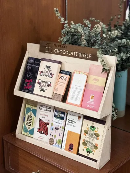 The full view of our Craft Chocolate Shelf, featuring brands like Soklet, Paul and Mike, and Chitra. It’s a chocolate lover’s dream.
