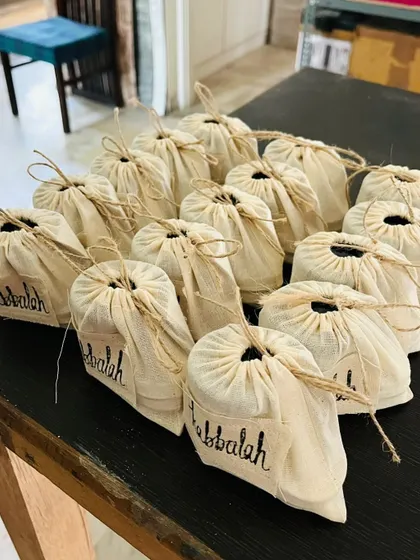 Another angle of a corporate gift order, showing the rustic charm of the twine-tied bags. It's a gesture of appreciation that feels genuine and caring.