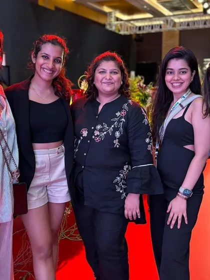 Our core team of mentors and artists all smiles on the red carpet after a successful show. We lead our students with experience and passion.